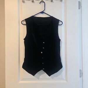 Small black velvety button up vest with detailed buttons